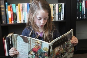 child reading comics